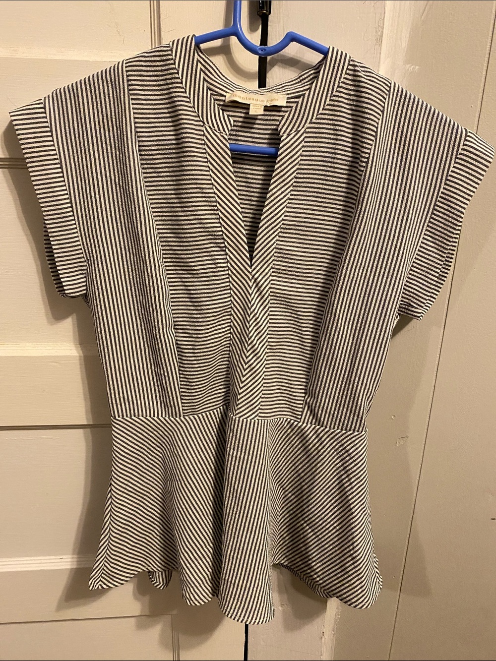 Striped V-Neck Peplum Top in Black and White